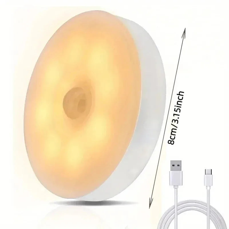 Warm Light variant of the round LED night light with USB cable